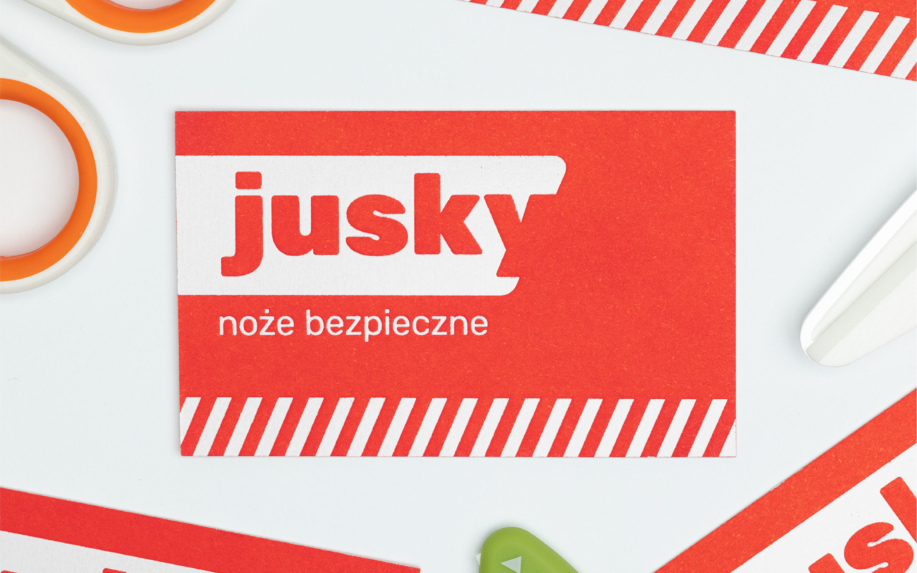 Jusky wizytówka z logo i tagline